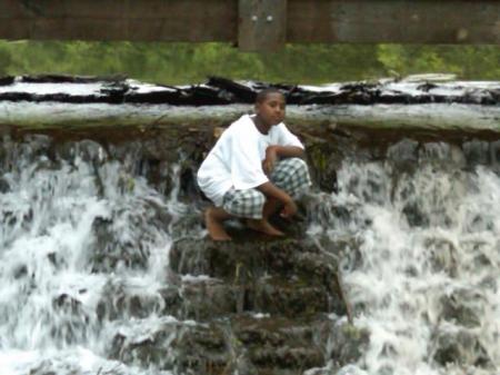 son on the water fall