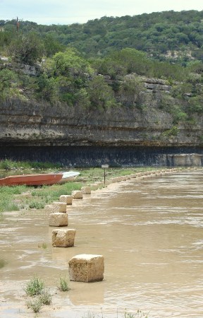 Driving in the river going to camp