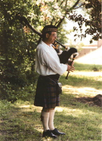 Jim playing his pipes