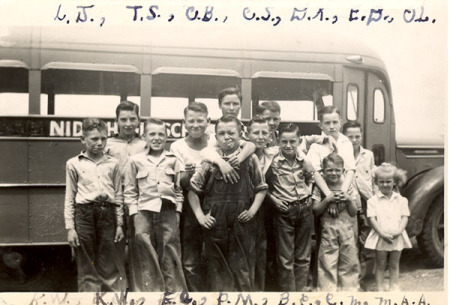 Boys by the school bus