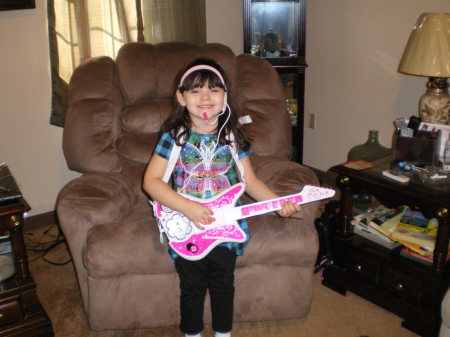 LEXIE AND HER NEW GUITAR