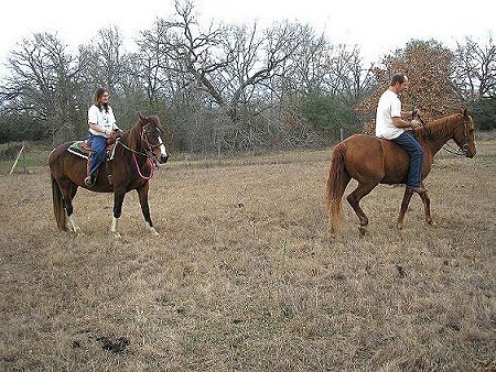 Alyssa riding Lily, Ronald on Ebony