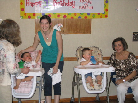 Both babies with grandma (me) sitting on the r