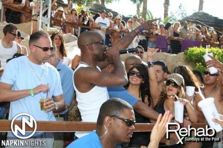 X performing at the Rehab Pool Party