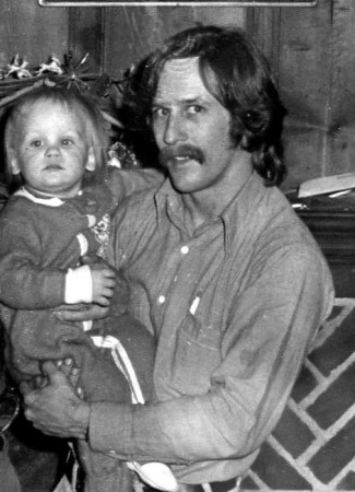 me 1975 with my son, Earle.