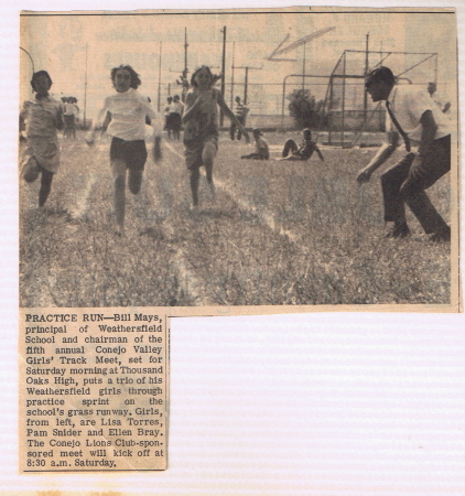 Mr. Mays coaching girls track