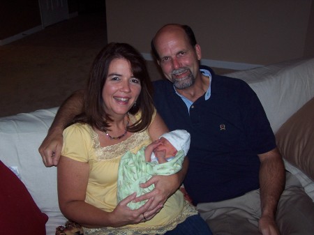 Bob and I holding our grandson!