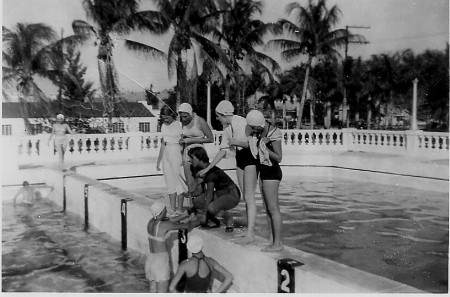 Coach Peg Newcomb and Girl Swimmers 1951