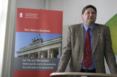 Bob Trogele recieving his Professorship