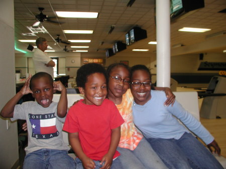 My kids and nephew (red shirt ) bowling...2002