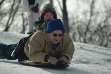 Grandson and PaPa sledding