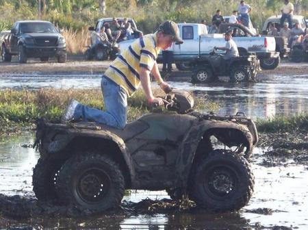 Nathan (my youngest son) playing in the mud!!