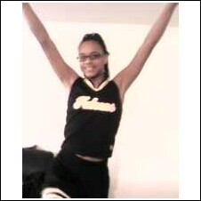 My lil girl cheerleading for her middle school