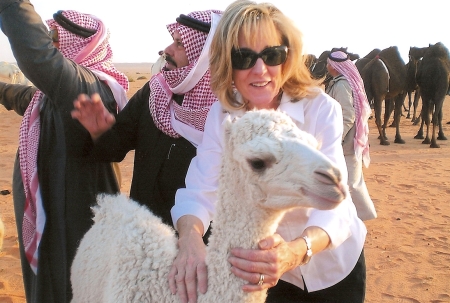 Baby camel w/Ann in Saudi Arabia desert 2/2009