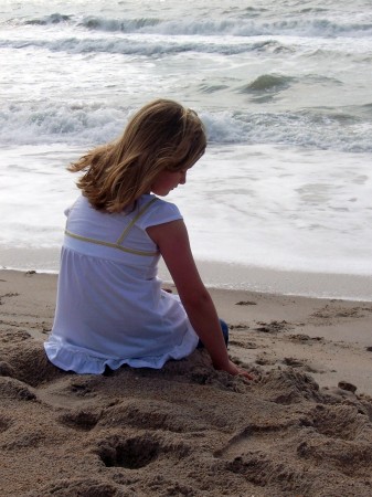 Carlee on the beach last summer.