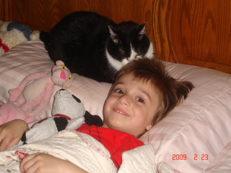 My son with my 13 year old cat Sylvester