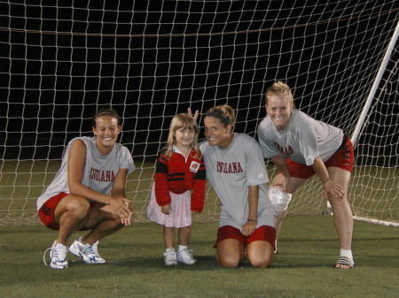 Gracie with IU women's soccer players in goal