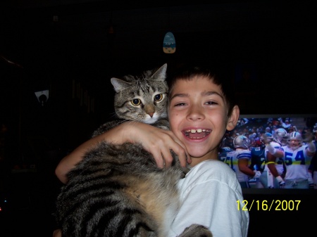 My grandson Alec &Tiger the cat