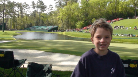 Braydon behind the 16th green at Augusta