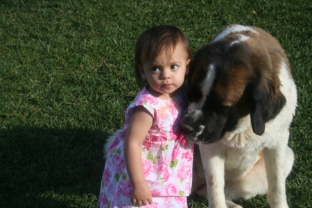 My granddaughter Haylie with our dog Malibu