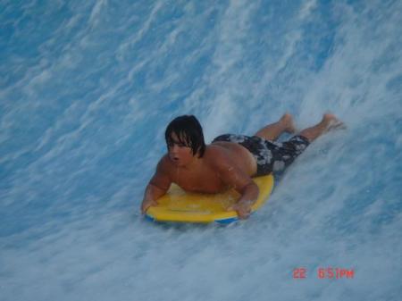 brendan surfing the raging waters in cali