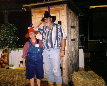 Ma and Pa Belton in front of the outhouse 2004