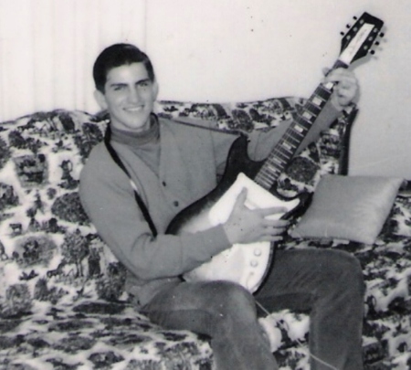 Ted playing guitar in 1965