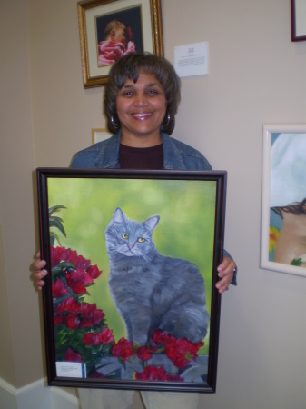 Sherri and one of her paintings