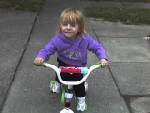 Lexi on  her bike