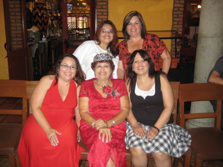 me & my sisters & grandma on her 80th