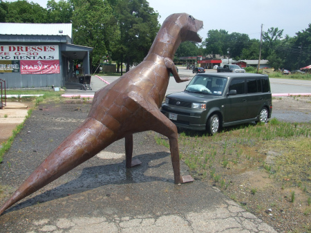 Dinosaur Attacking Car