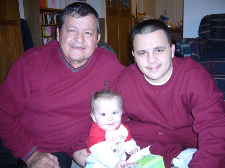 My son and I with my granddaughter