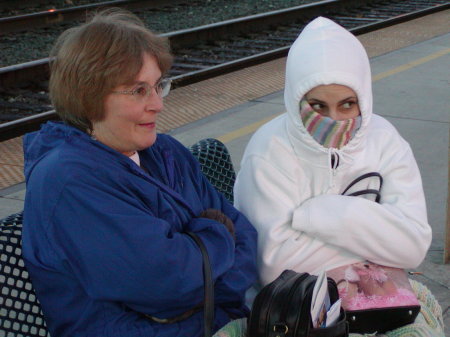 Wife and daughter waiting for a train in Sacra