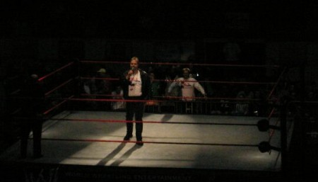 In the ring at a WWE event-just announcing