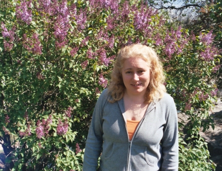 standing in front of a lilac bush in Boise, ID