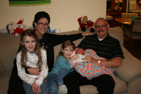 My husband Chic, myself and the 3 grandkids