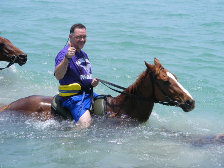 Riding a horse, in the water, in Jamacia