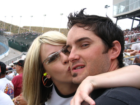Brittney kissing her husband Mike