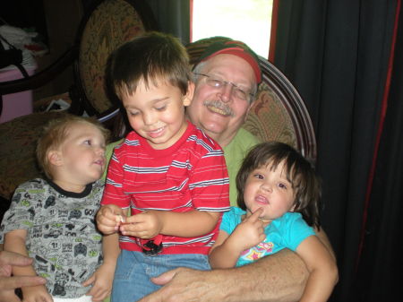 Grandpa with three youngest grandchildren