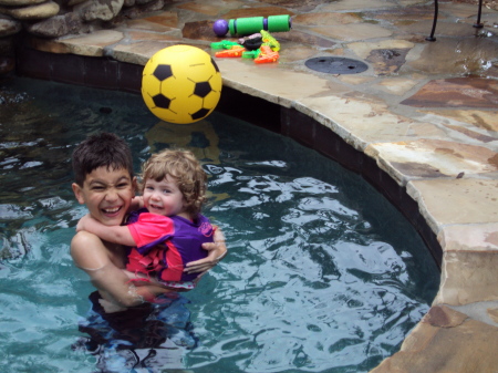 my son and daughter swimming
