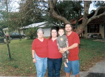 My kids and grandson Christmas Day, '08