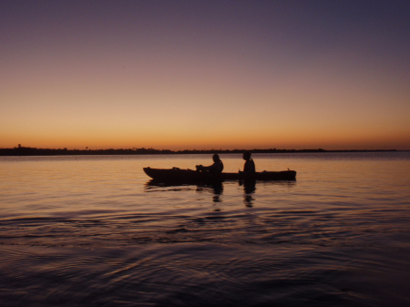 kayaking at sunset