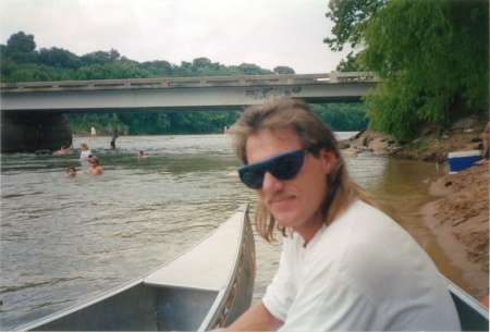 Canoe on the Brazos sporting a mullet 1994