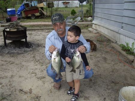 My dad and Ian after fishing at the lake house