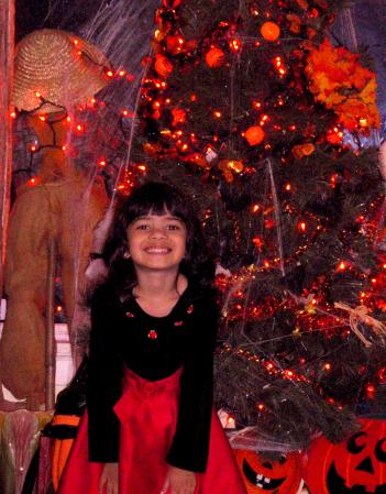 Jenny in front of the Hallow's Eve tree.