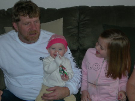 My husband Brett and 2 of our Granddaughters