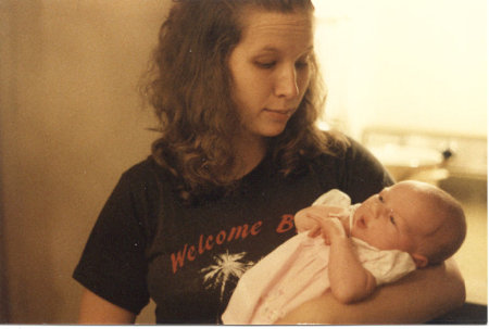 Me at age 20 with my baby girl (25 years ago)
