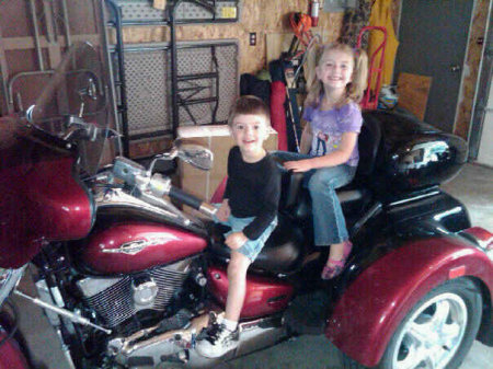 Caitlin and Owen on Grandma's motorcycle