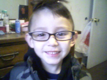 My Baby Adrian wearing mommy's glasses