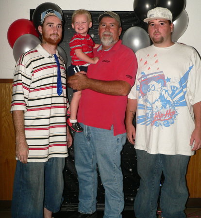 My husband Terry, my 2 stepsons, and Grandson